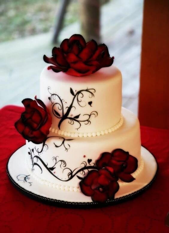 White cake with red roses
